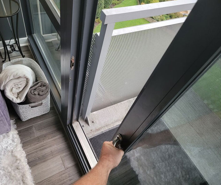 make a sliding door run smoothly