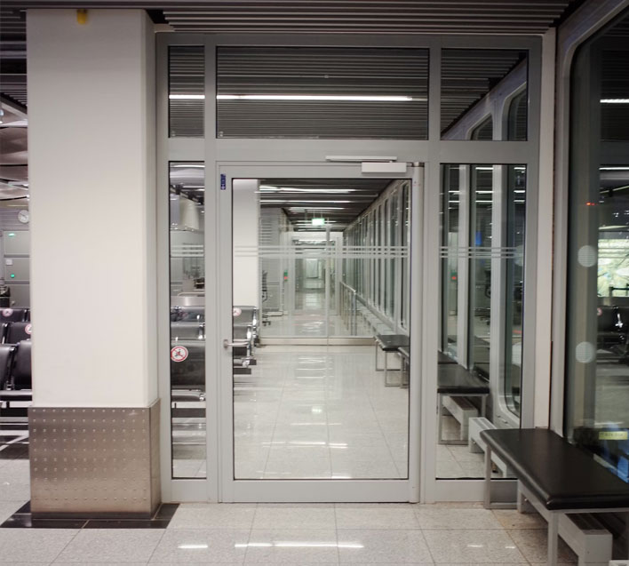How do you maintain a commercial door